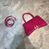 balenciaga hourglass small handbag in dark pink for women womens Sneakerhead bags 9in23cm buzzbify 1